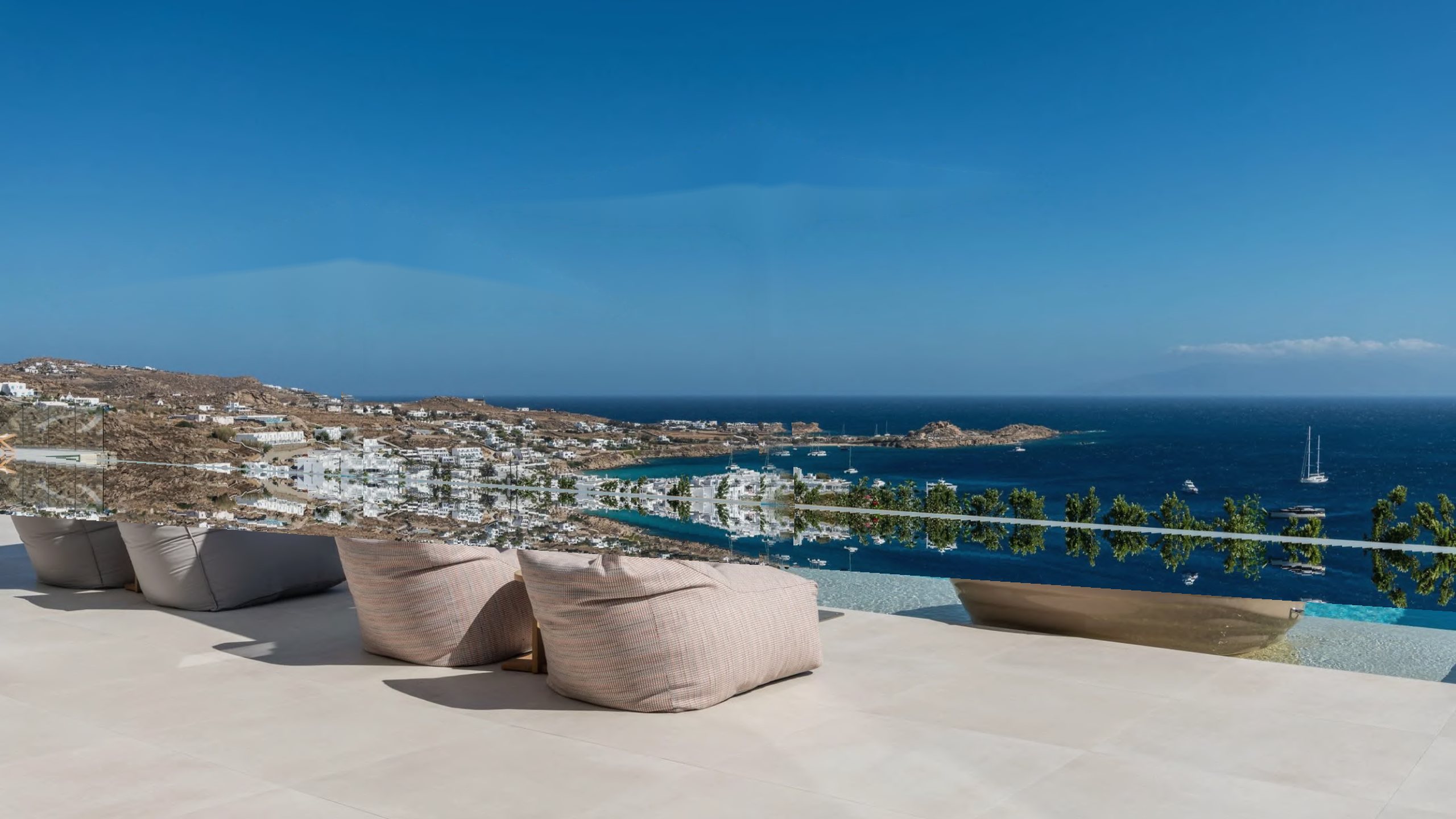 A private villa terrace with an infinity pool above the Aegean, Mykonos